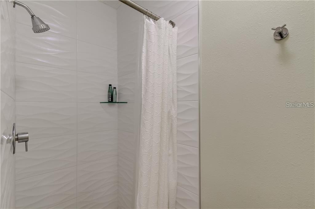 His and Her Restroom facilities at the pool with shower and sauna. (Recently updated.)