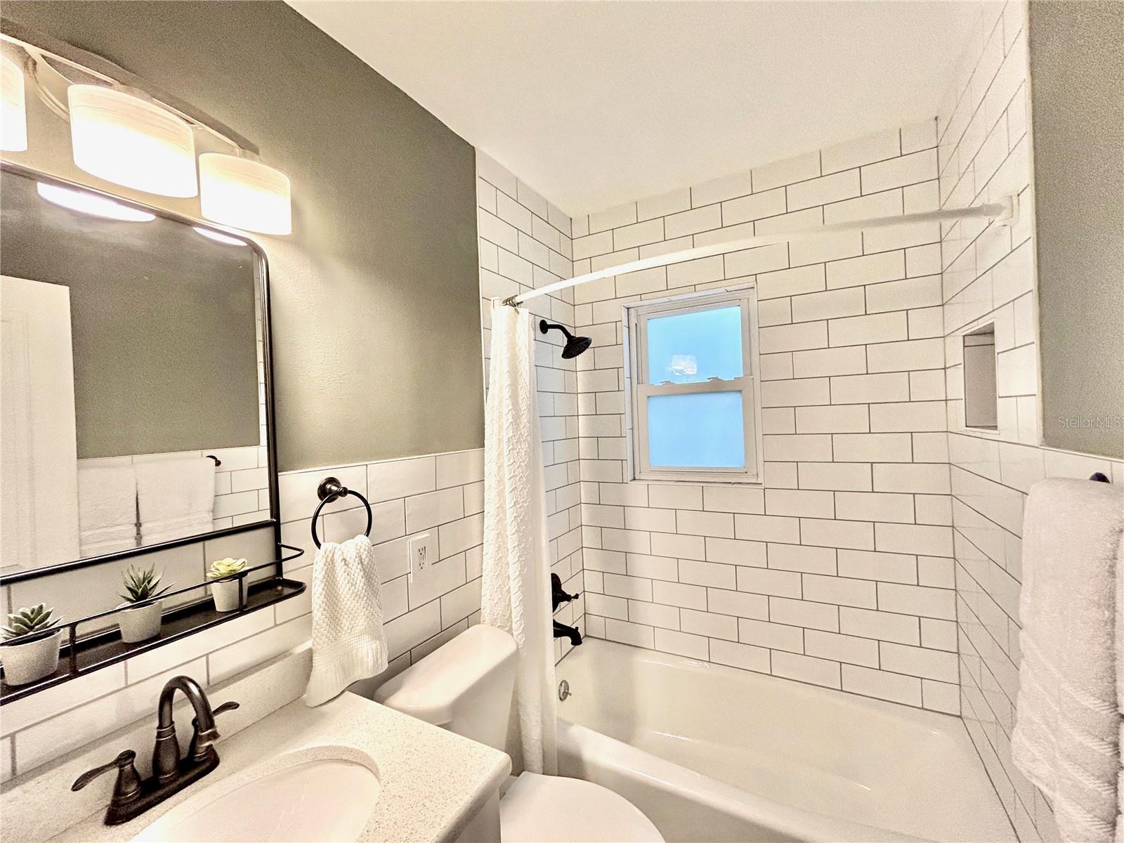 Full Guest Bath with shower &amp; tub.
