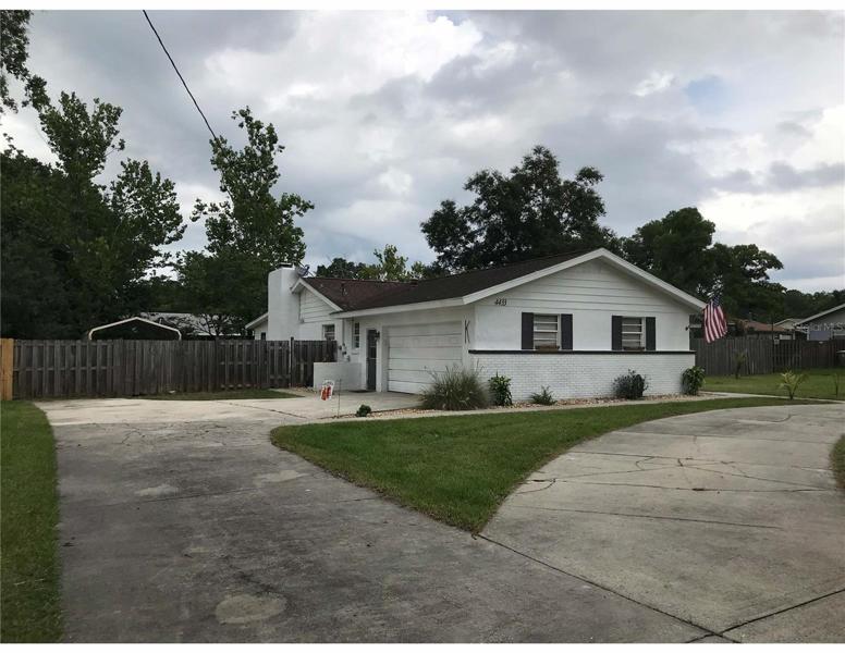 Driveway and Garage Side of Home