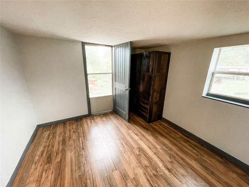 Bedroom #3 / Exterior Door to Backyard