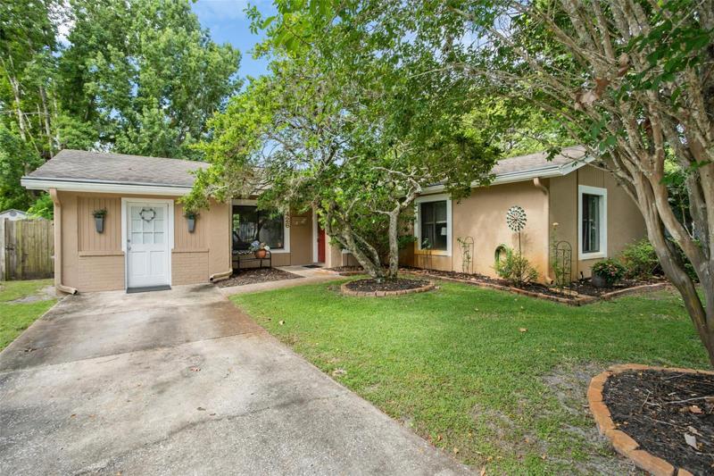 Home located on cul-de-sac street with mature landscaping