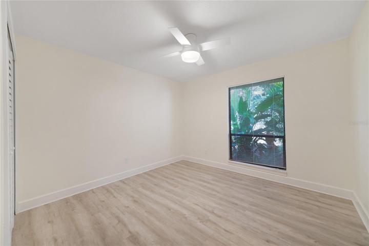 Bedroom 2 with window to backyard