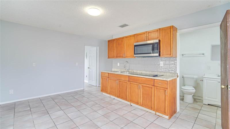 Another View showing the bathroom in the background