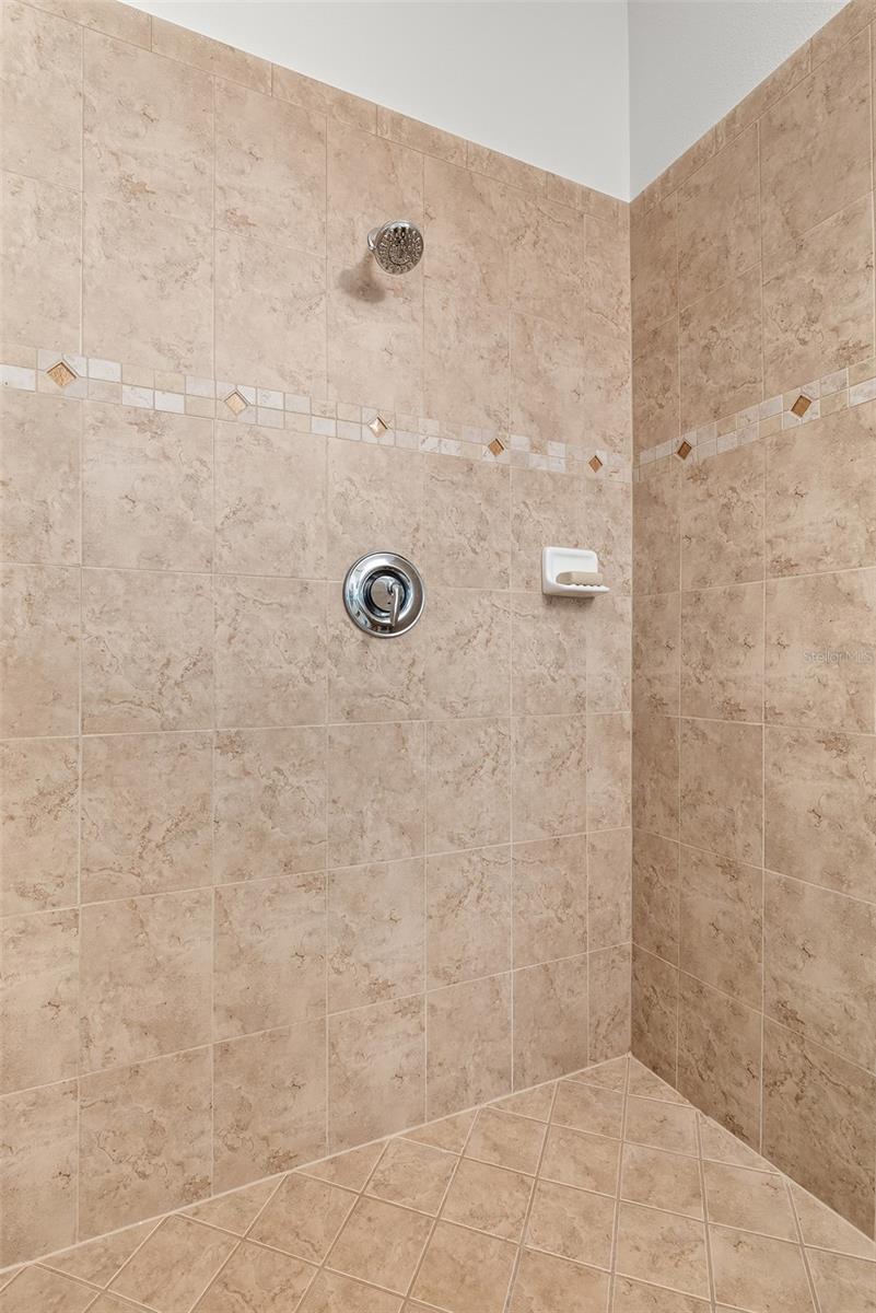 Ceramic tile shower enclosure