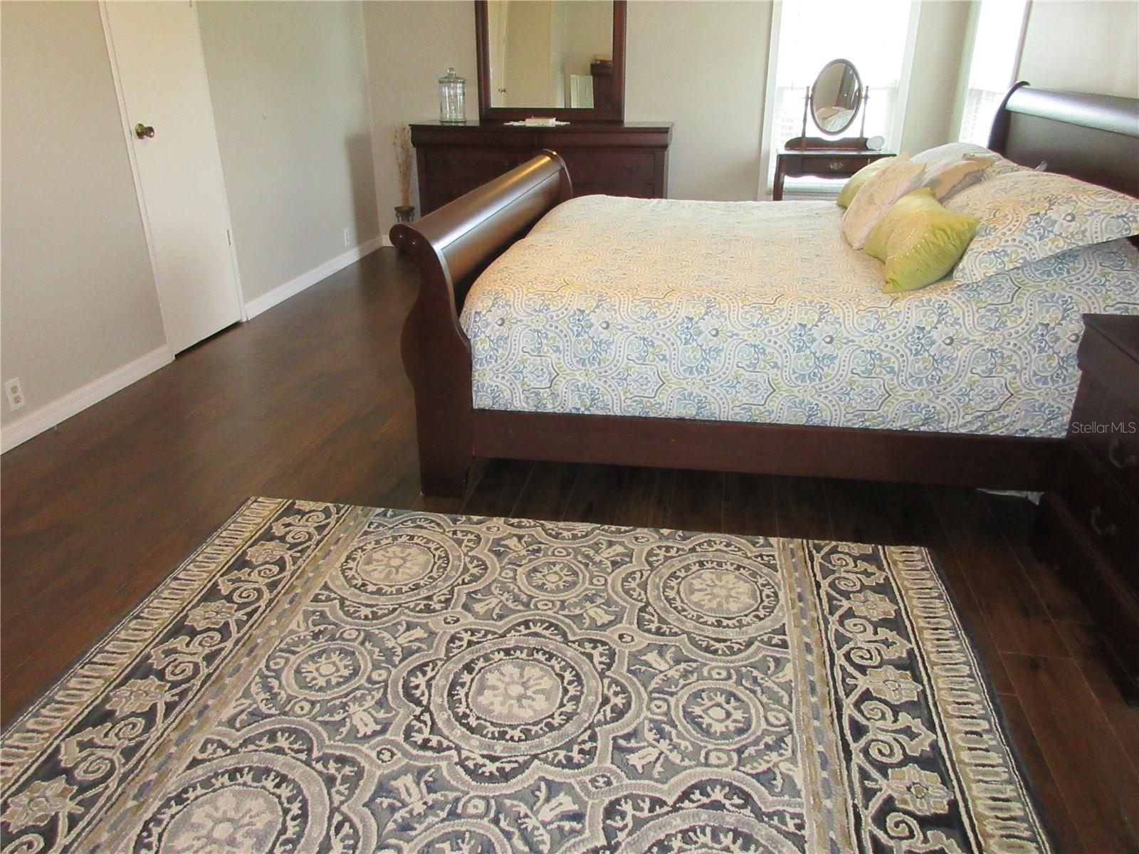 Master bedroom- laminate wood flooring