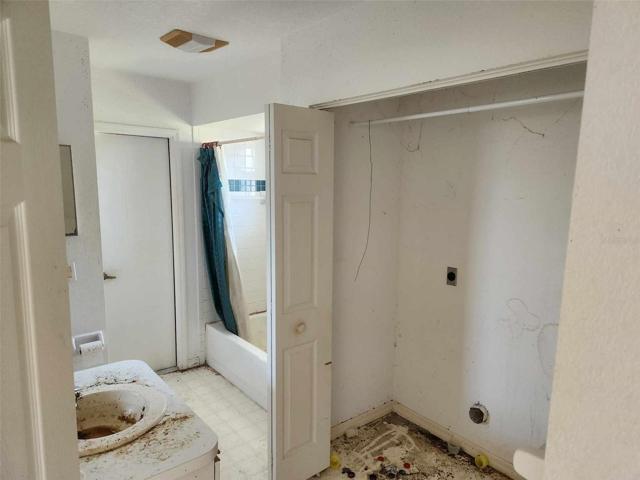 Bathroom 2 w/laundry also has access to pool area