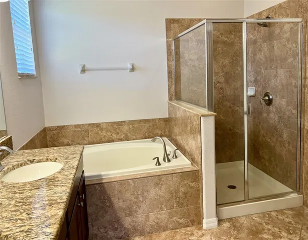 Large soaking tub in Owner's suite