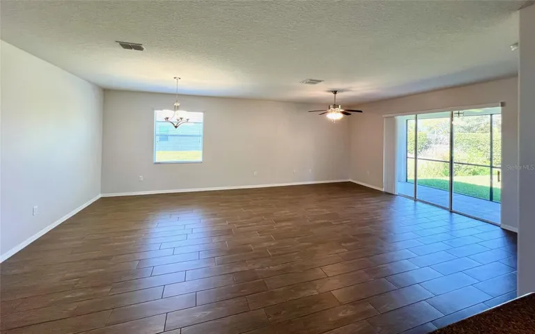 Upgraded wood-plank tile flooring throughout
