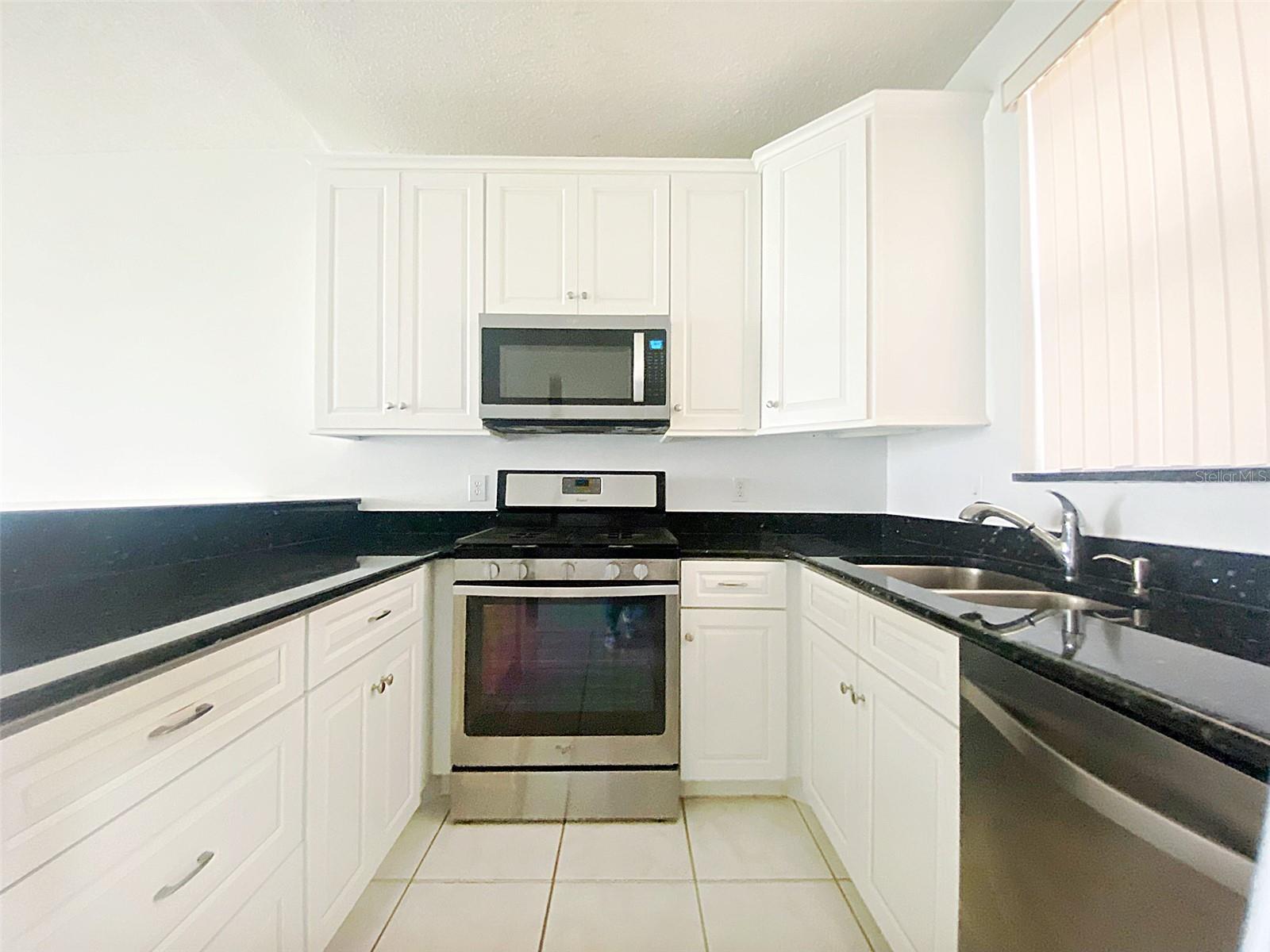 Kitchen with granite countertops