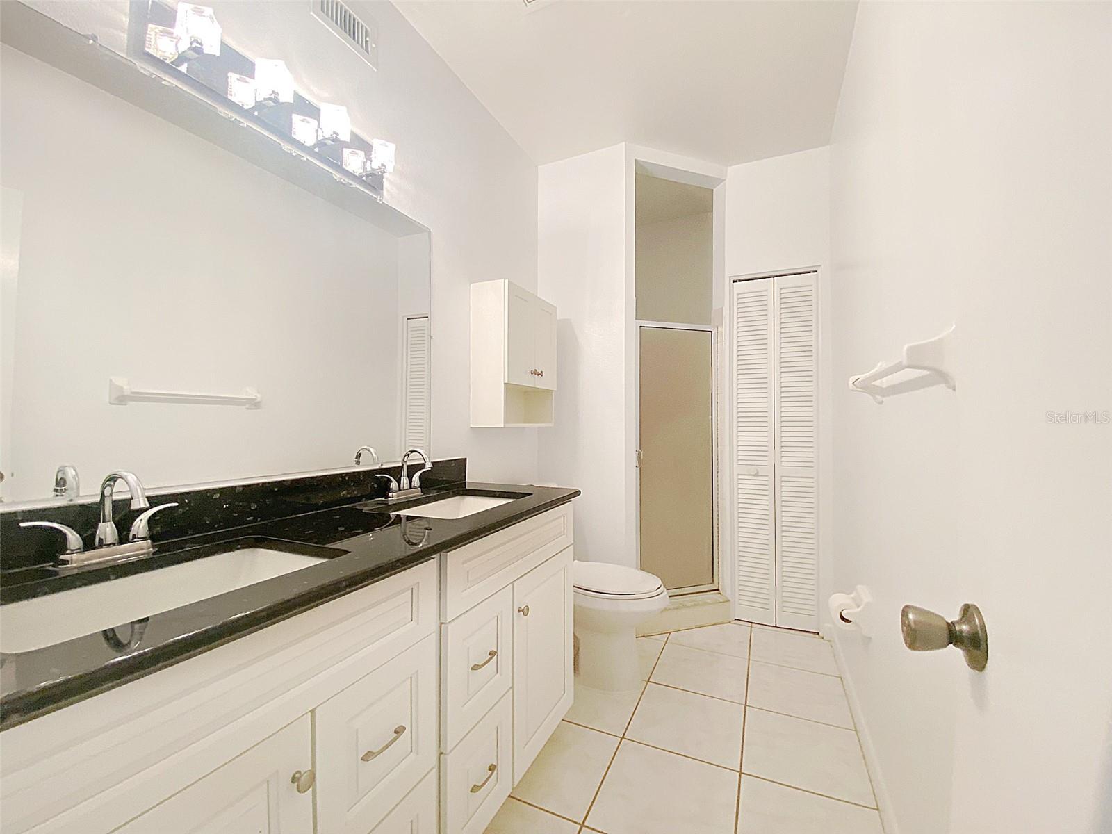 Master bath offers dual sinks
