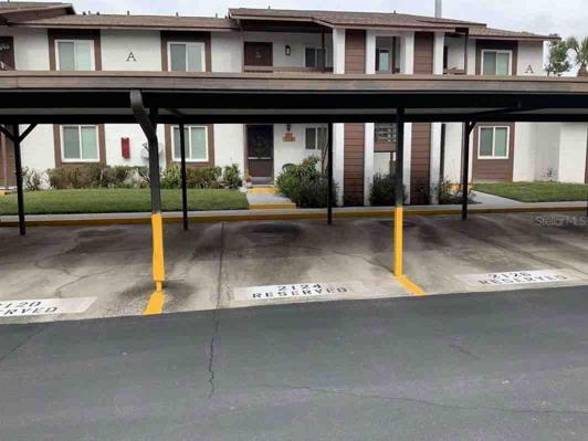 FRONT W/ ASSIGNED COVERED PARKING