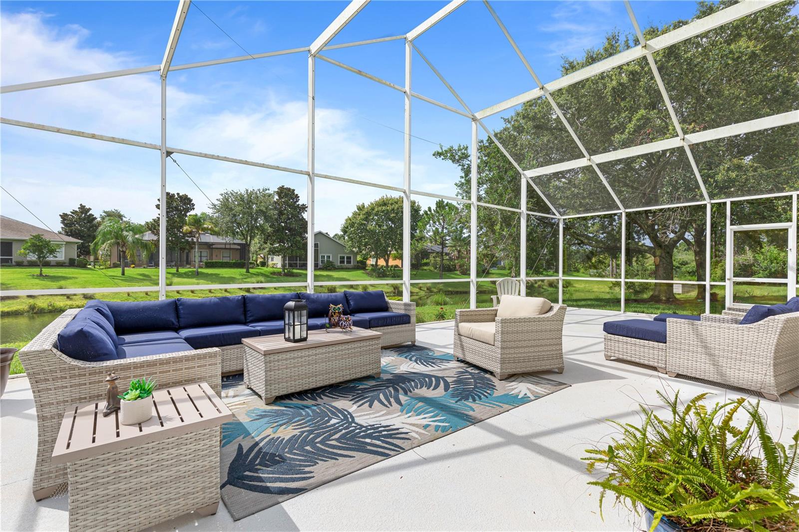 LARGE EXTENDED SCREENED LANAI!!!  GORGOUS LAKE VIEWS