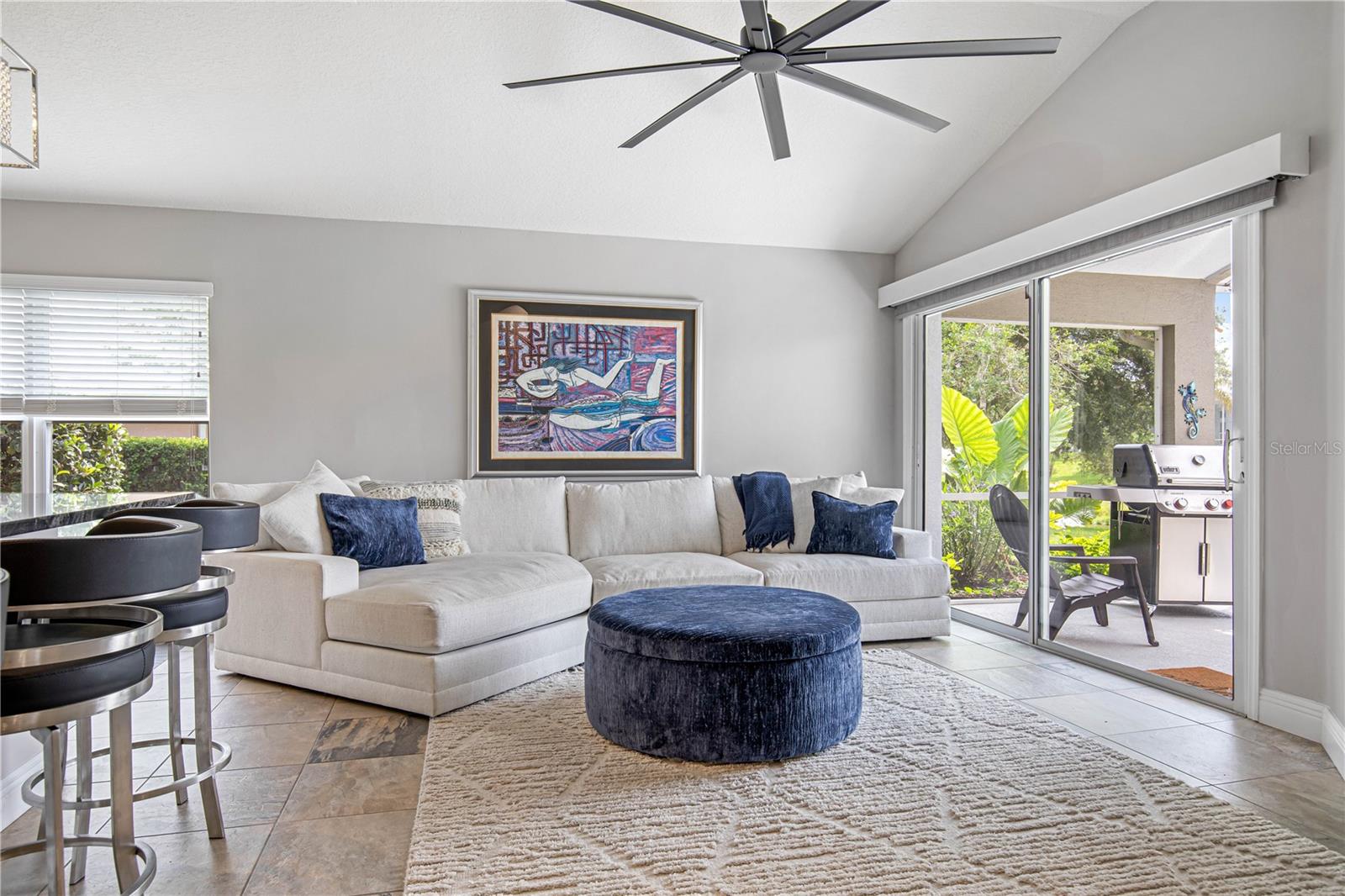 LIVING ROOM SLIDING DOOR W/ELECTRIC SUN SHADES