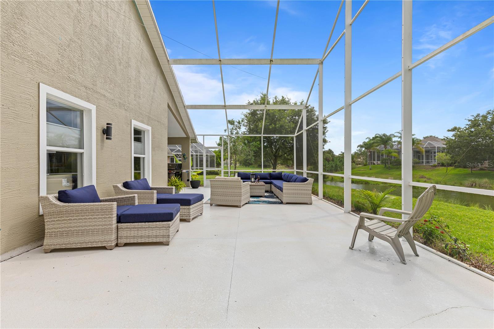 LANAI EXTENDS OUT 100' &amp; OVERLOOKS LAKE