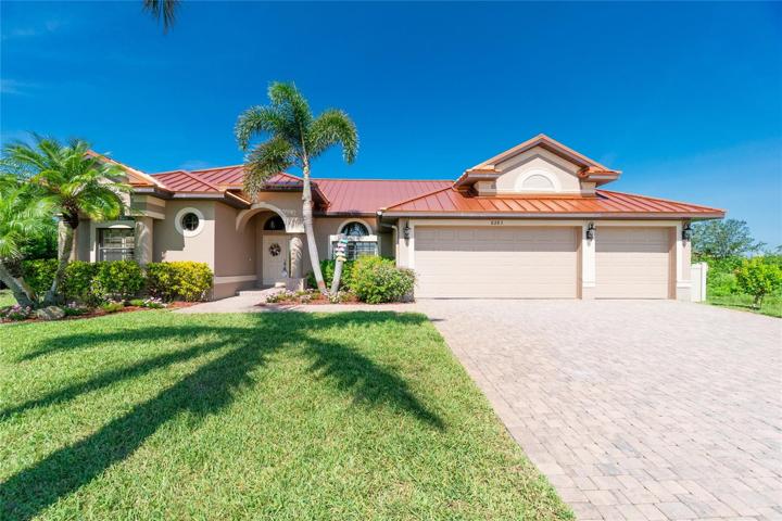 Front of home with new metal roof