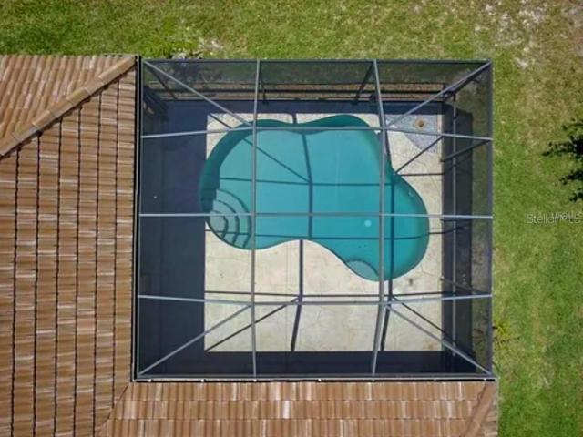 Image of pool area prior to new roof