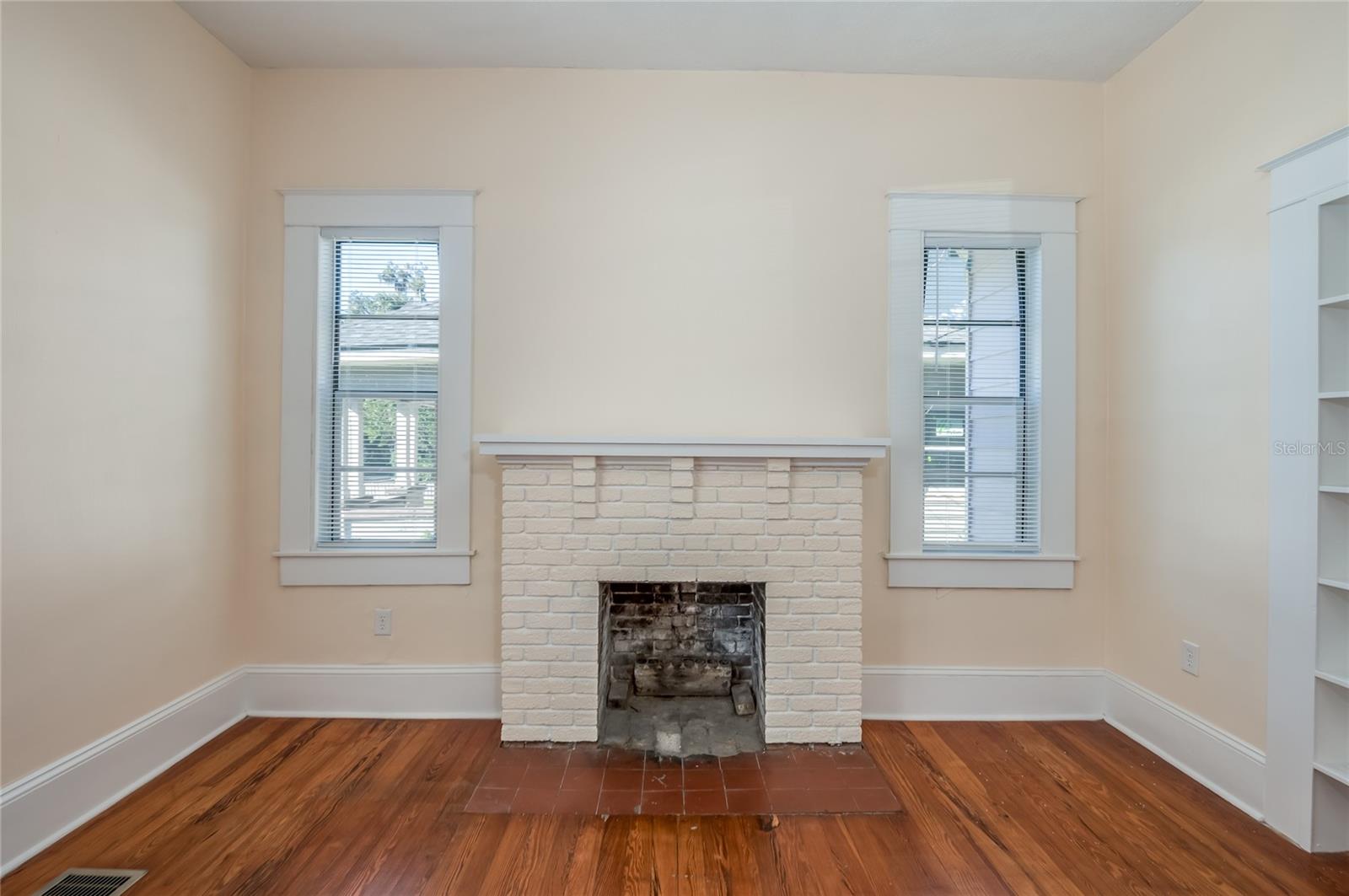 Living room with decorative fireplace