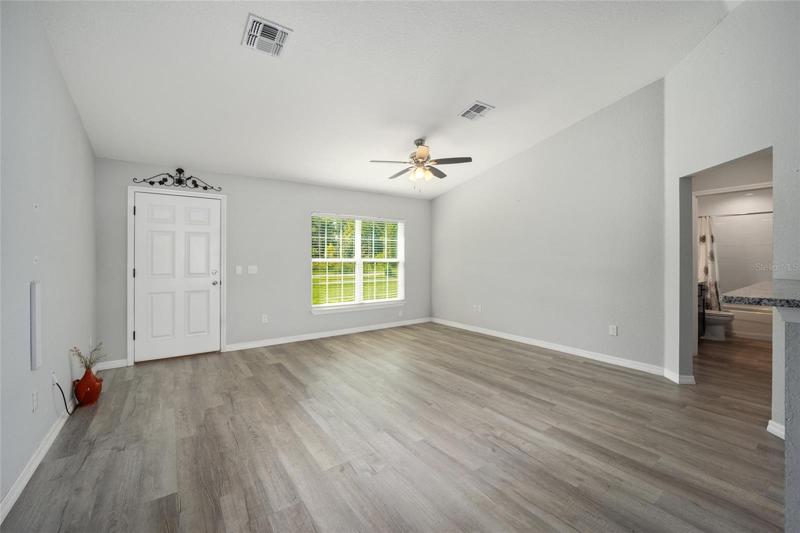 large living area with LVP