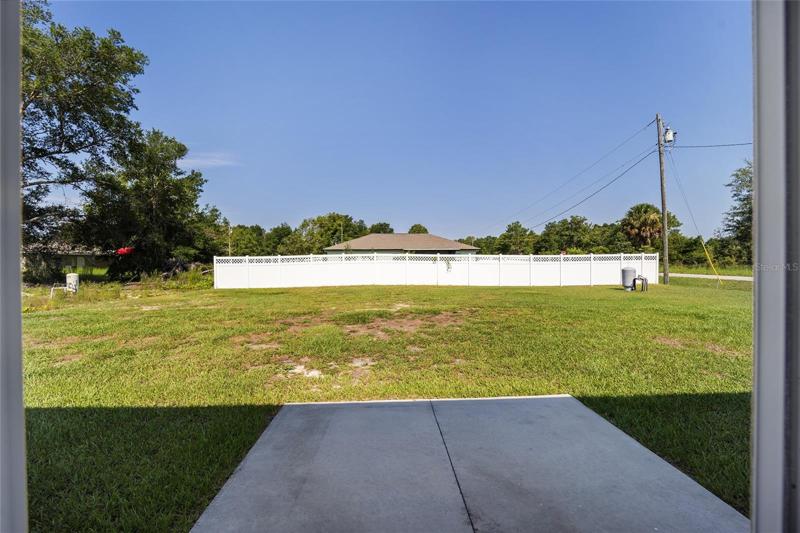 back yar (neighbor has fence for privacy. You can do a lot with this yard
