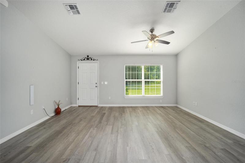 Ceiling fan in living room and Blinds in all rooms