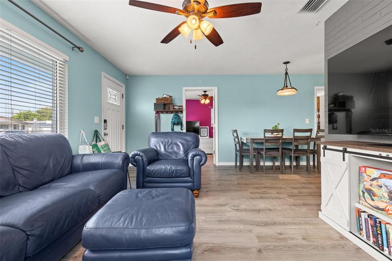 View of Living Room and Dining area. Vinyl plank flooring