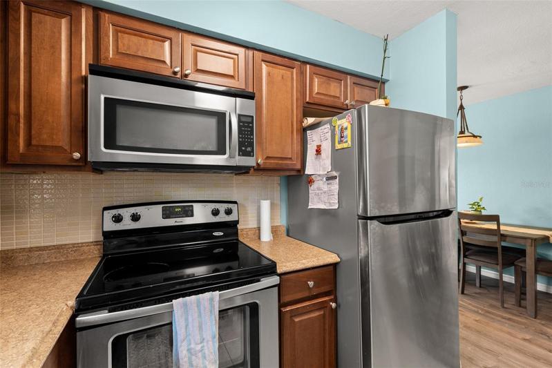 Kitchen view, new refrigerator