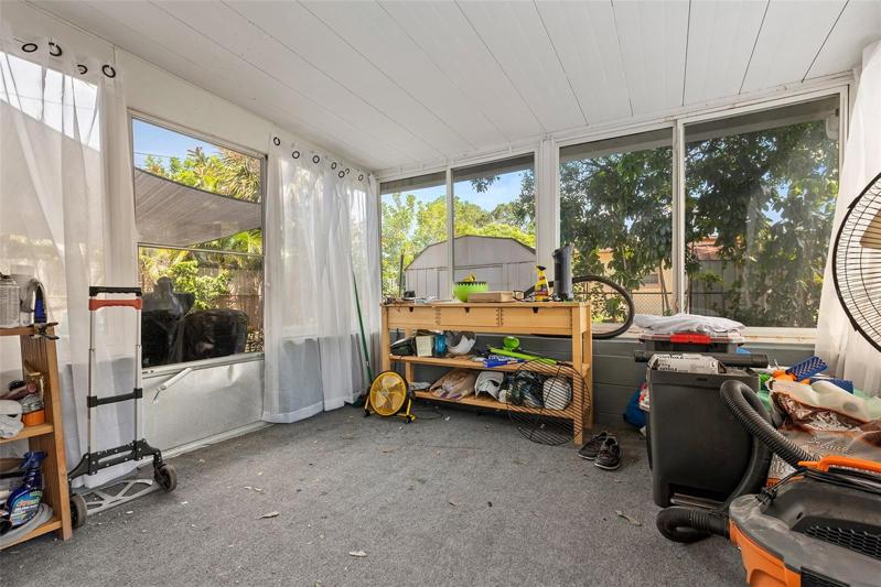 Back patio view can be used as inside or outside Florida room- not counted in square footage of house