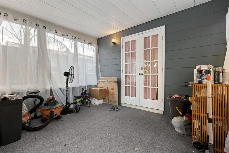 Back patio could be a Florida room or inside patio space