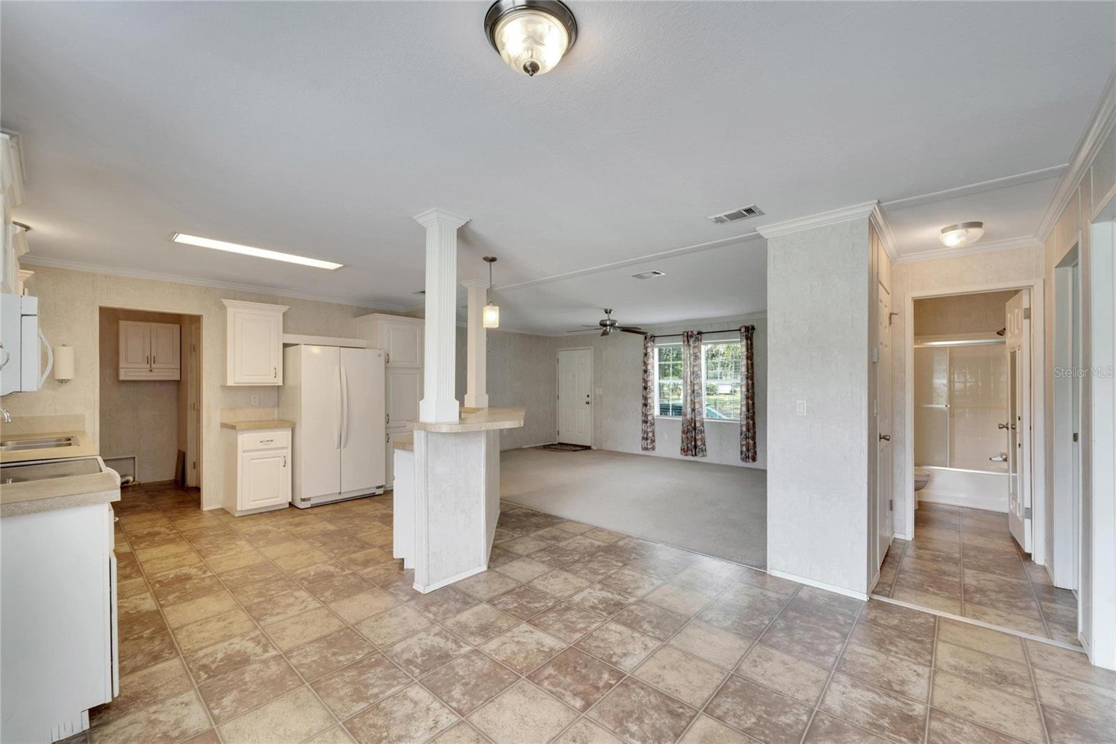 Dining into the kitchen and the living room