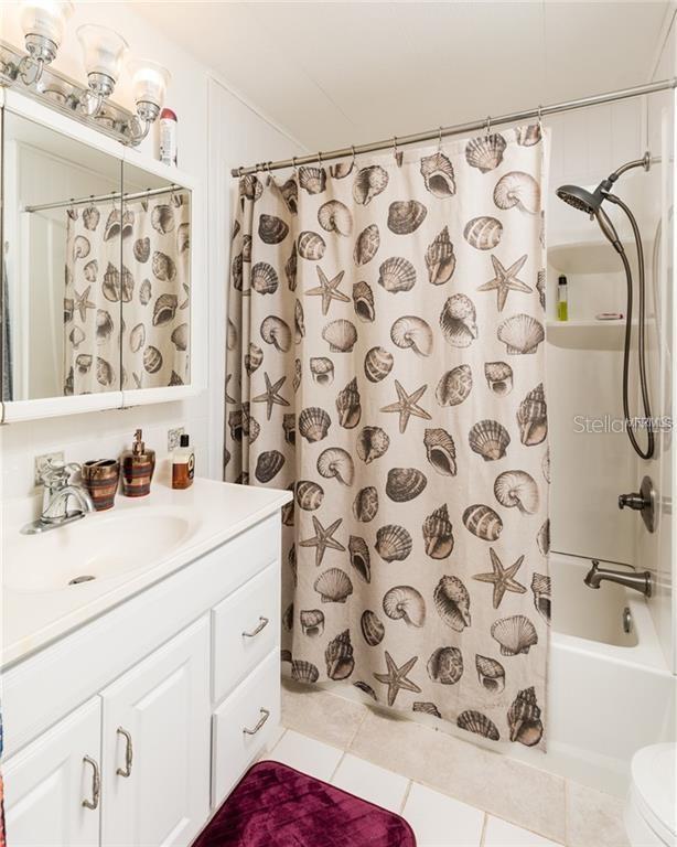 Full bath clean and neutral colored