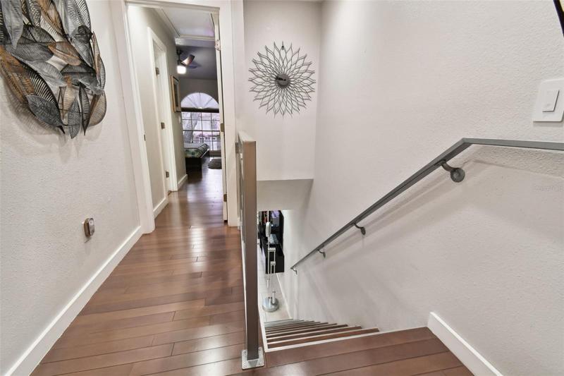 STAIRS CUSTOM RAILS, AND HARDWOOD FLOORS