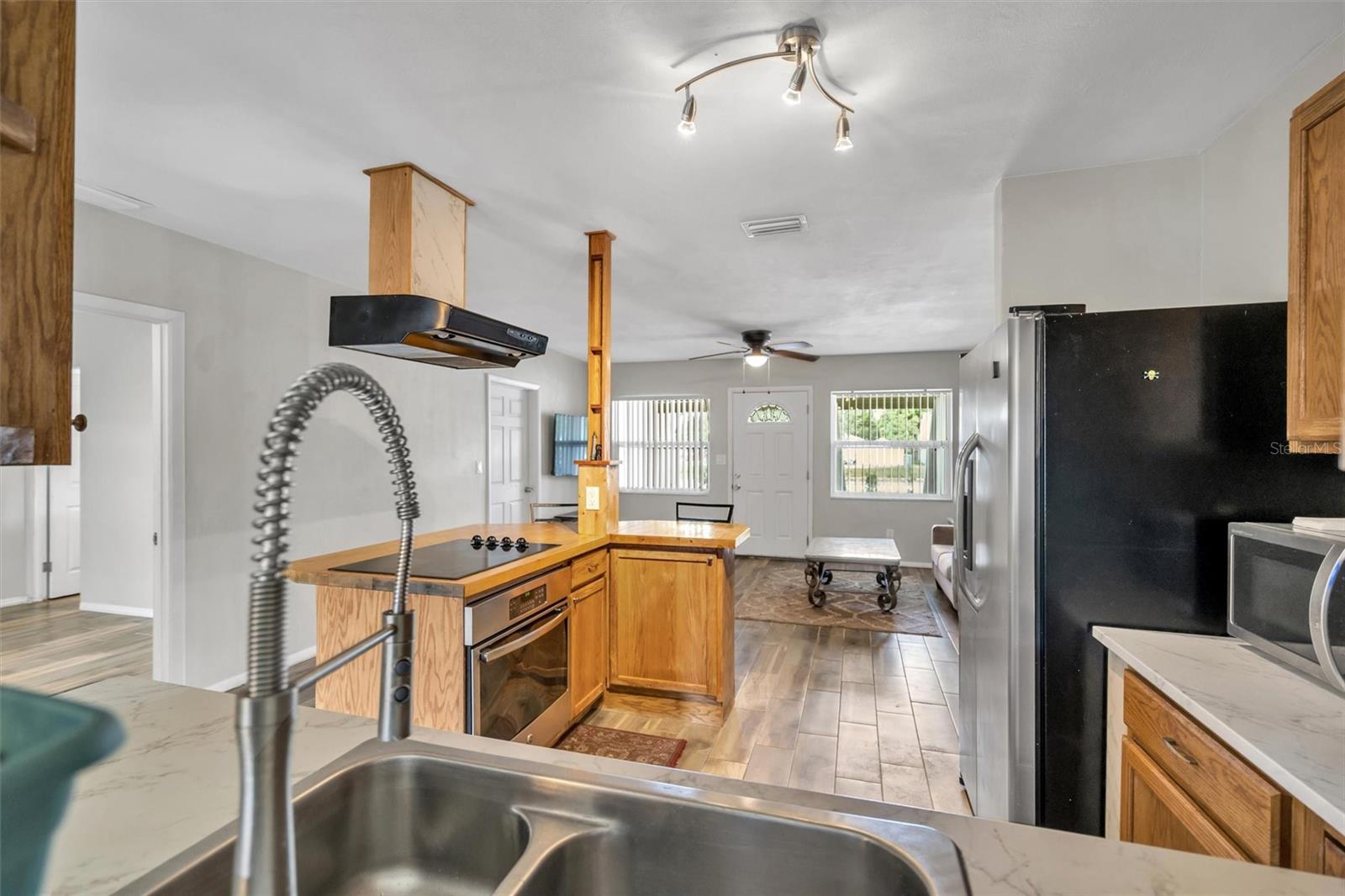 Kitchen with Solid wood oak cabinets