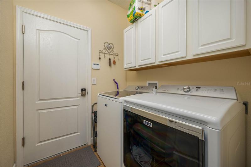 Inside Laundry with lots of storage