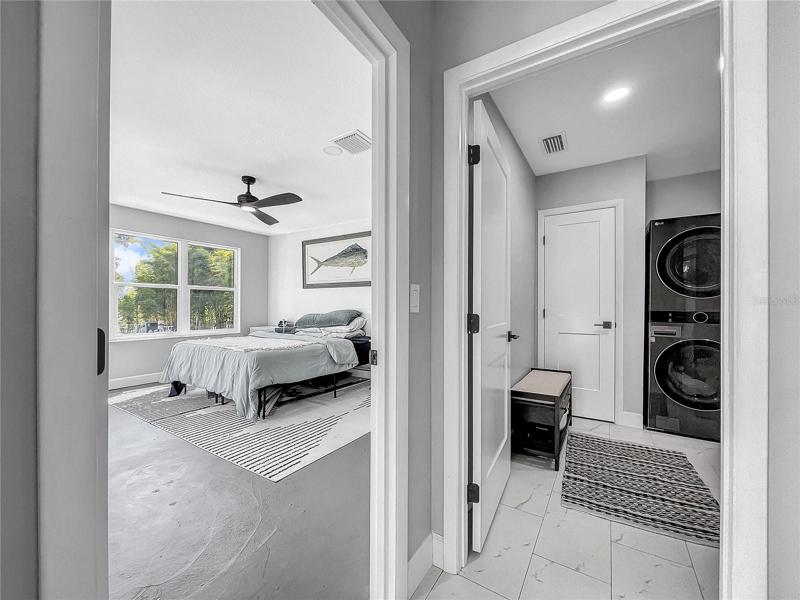 Entrance to Primary Bedroom and laundry /Mud room