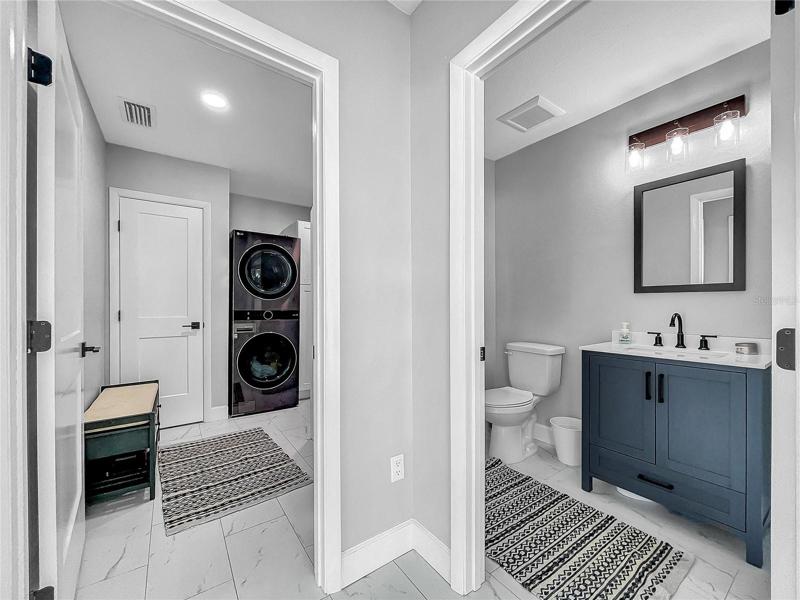 Laundry/Mud Room and entrance to Half Bath.