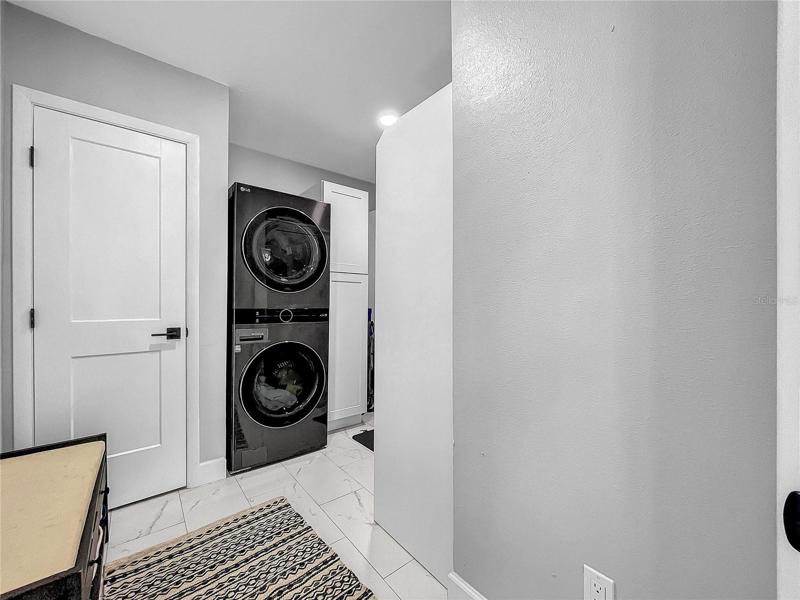 Laundry/Mud Room with access to parking pad (future garage)