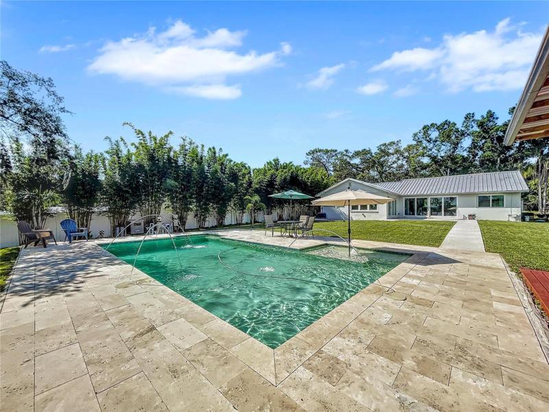 New Trendsetter Heated Pool, beach area, travertine decking, led lights, fountains, salt water.