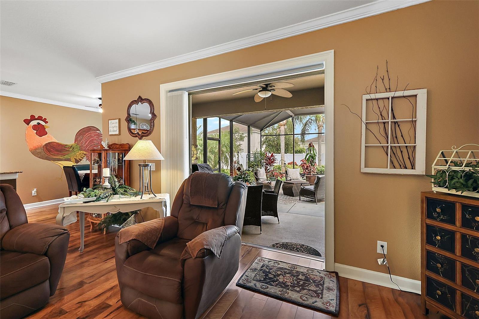 Pocket Trifold Slider Opening up to Breathtaking Enclosed Lanai