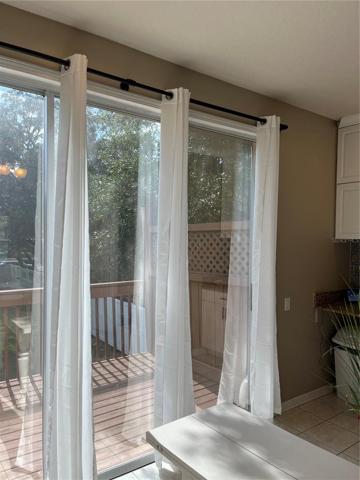 Slider off the kitchen leading to the outside deck