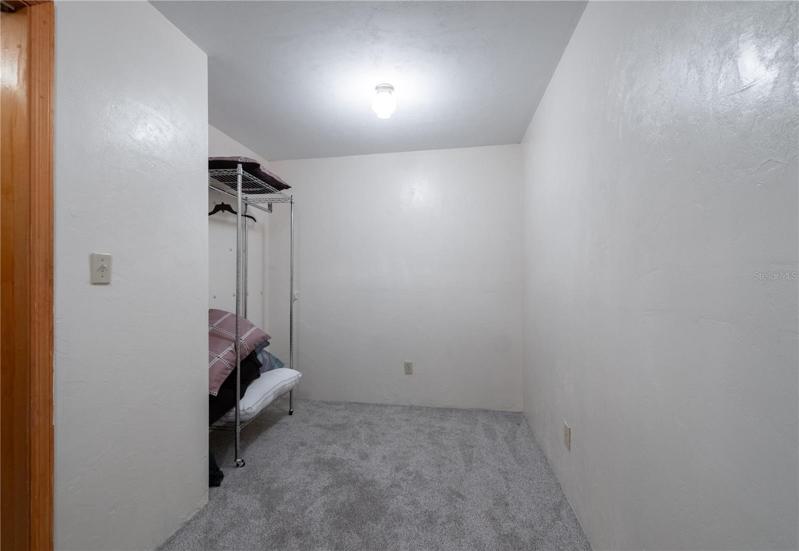 Large walk-in closet hallway of upstairs