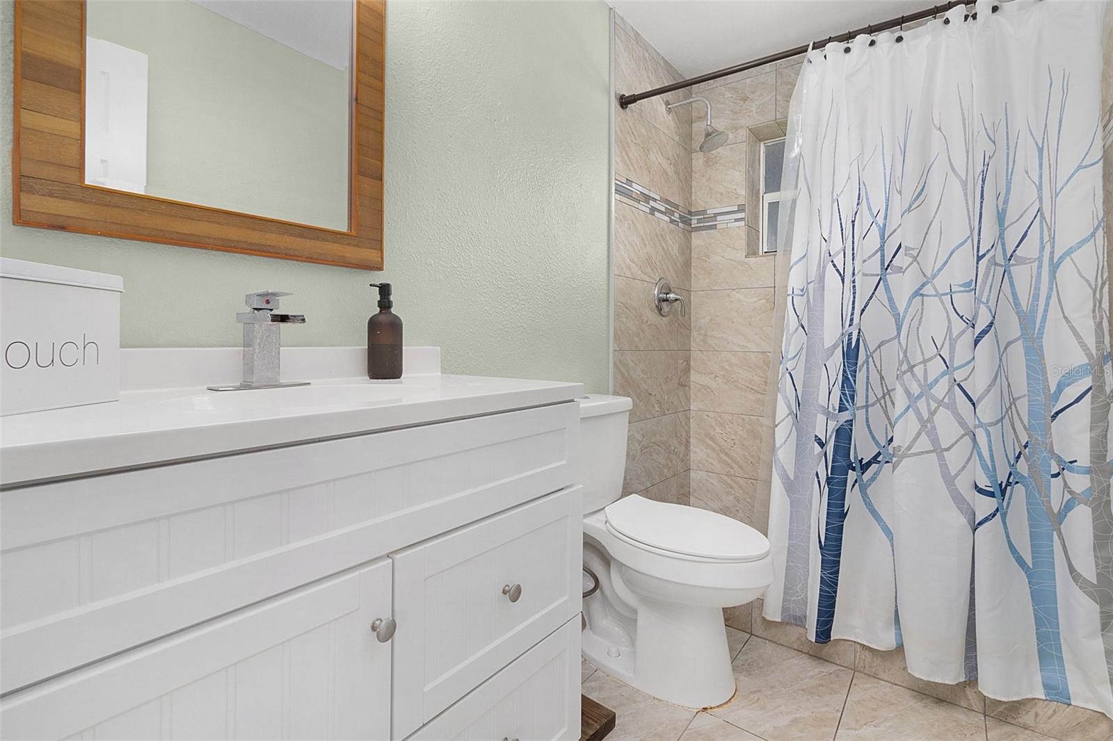 Bathroom looking towards shower.