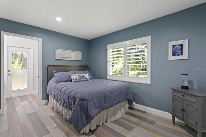 The 3rd bedroom includes new luxury vinyl plank floors and an ensuite bath