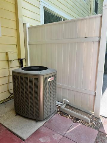 The outdoor AC condenser is under cover which will help it live longer!