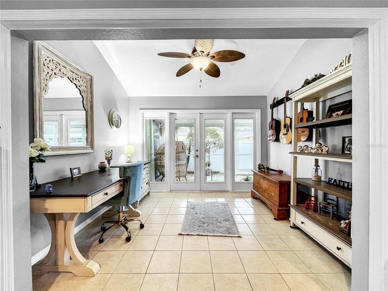 Glass French doors go to beautiful patio
