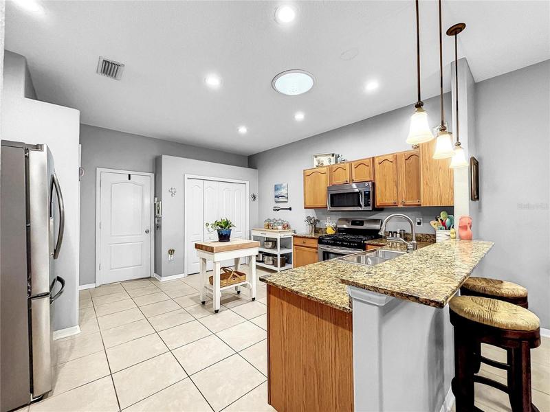 Laundry and pantry behind folding doors