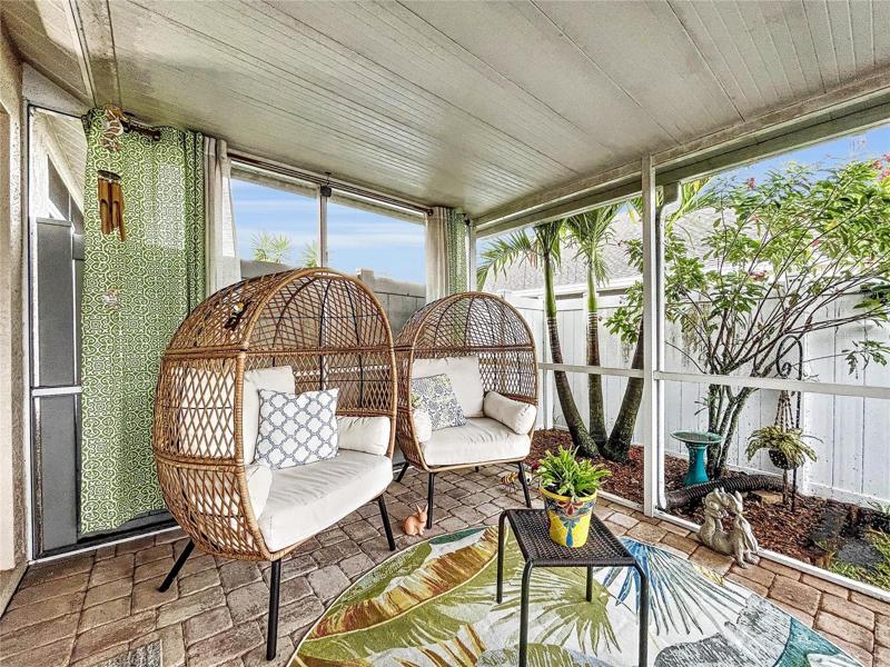Relaxing screened patio with partial covered roof