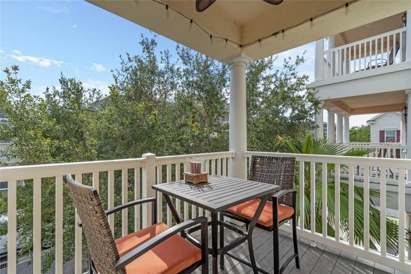 Covered balcony off the great room perfect for breakfast.