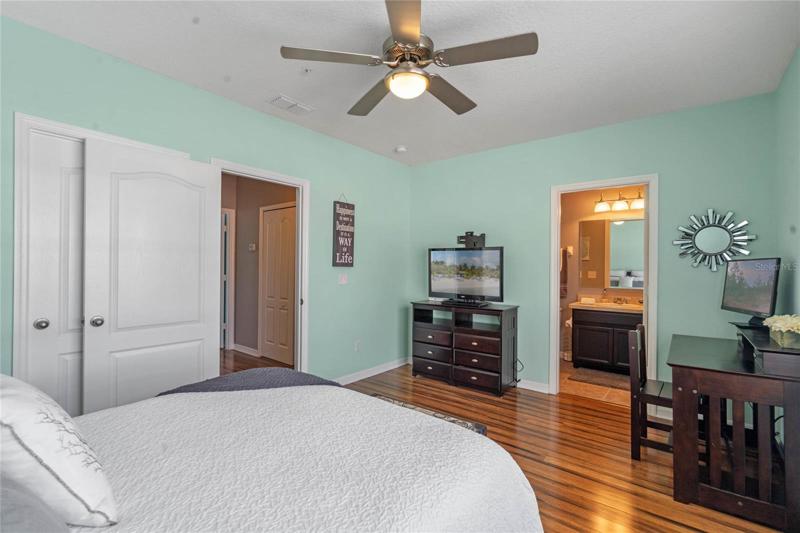 Secondary bedroom two on the third floor has an en-suite bathroom.