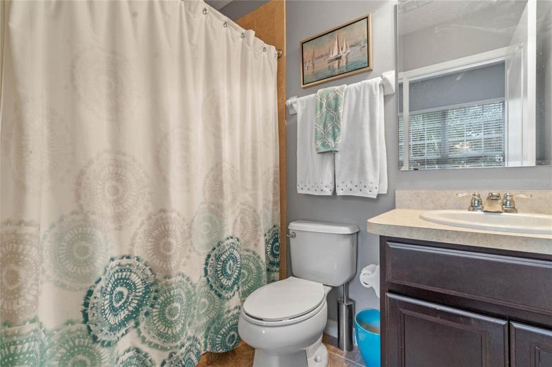 En-suite bathroom three to bedroom three.