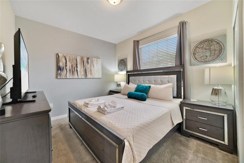Your main floor also delivers a bedroom and full bath and a convenient half bath with direct access to the lanai!